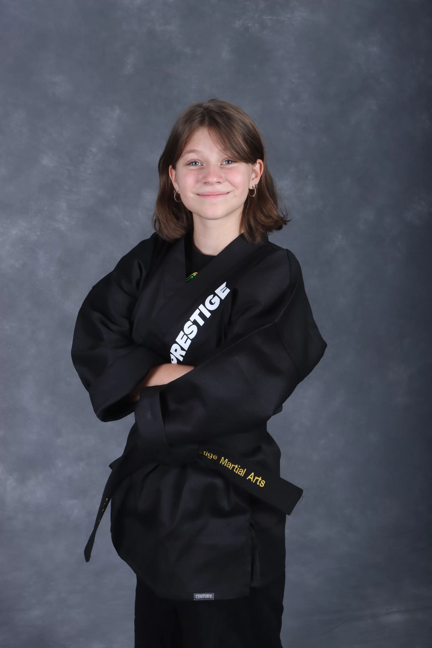 black belt girl with arms crossed, Teen martial arts