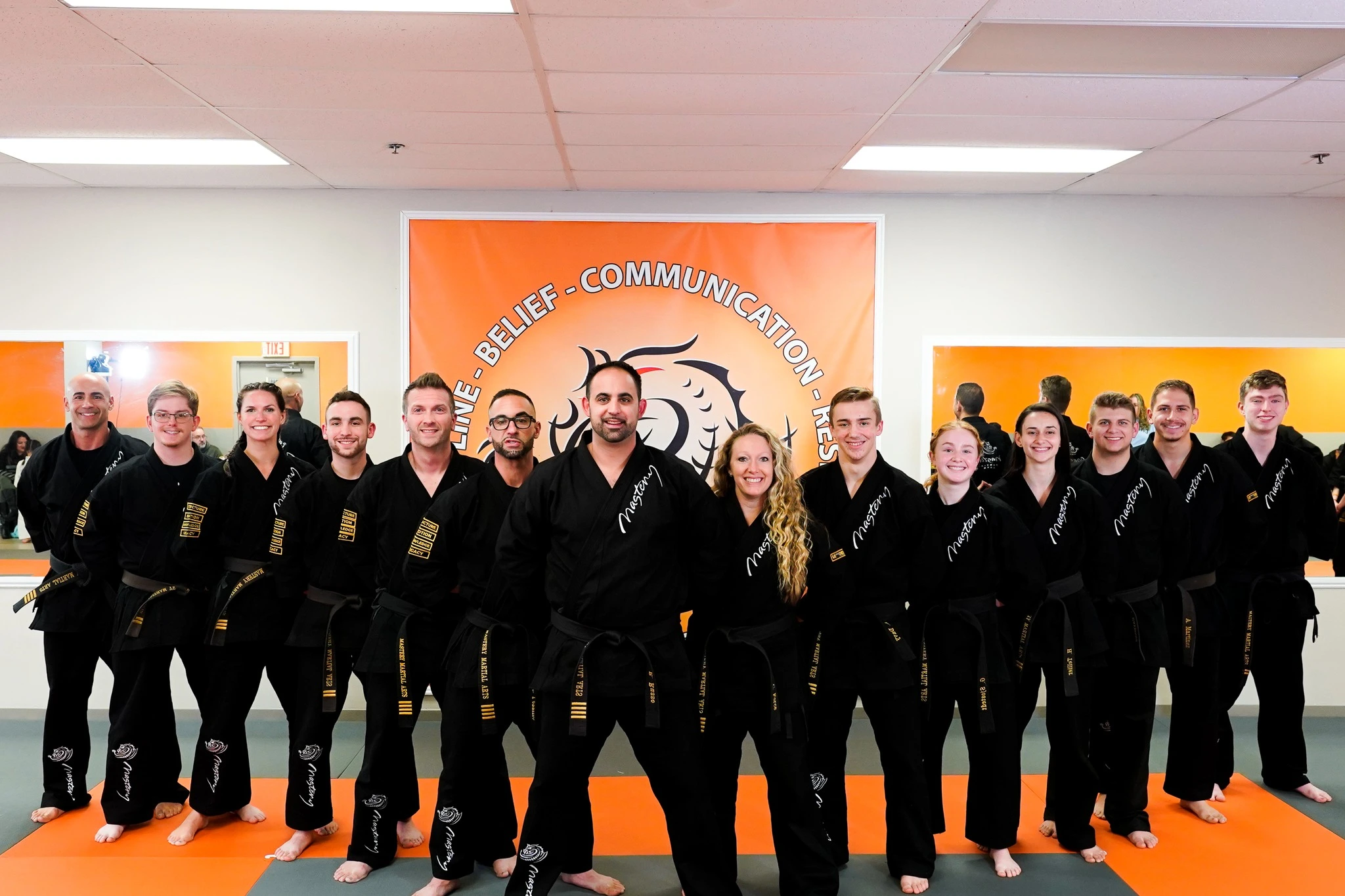 2 rows of black belt instructors 2 rows of black belt instructors