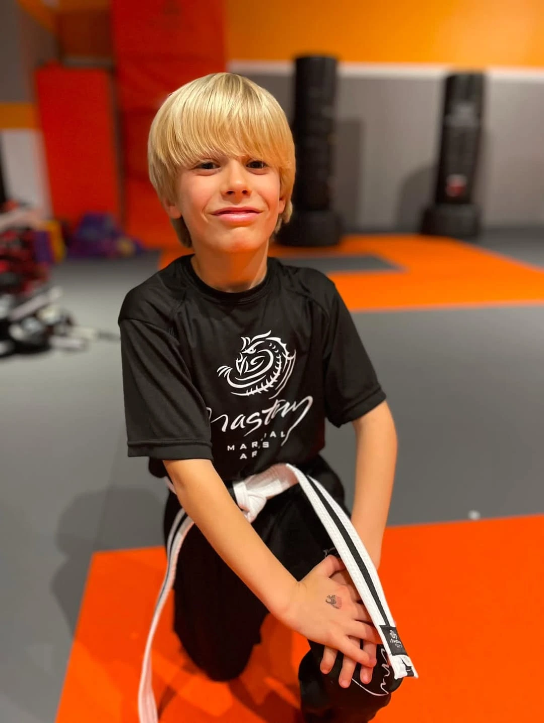 karate boy on one knee karate boy on one knee