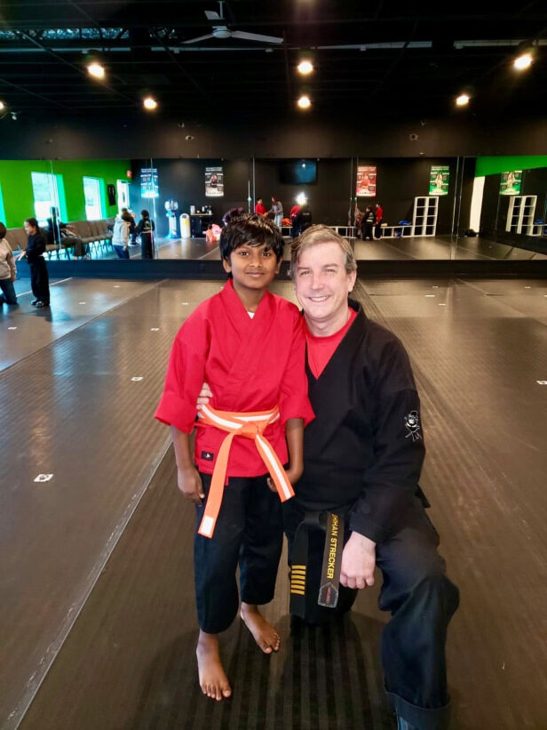 Lochan with Mr. Strecker, his martial arts mentor and role model